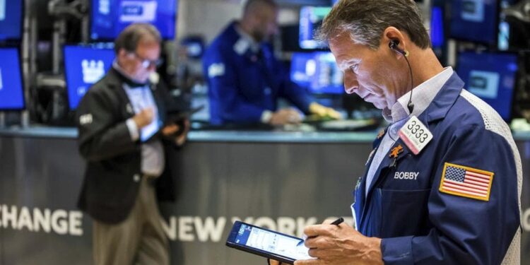 Asian shares slip ahead of Fed interest rate decision