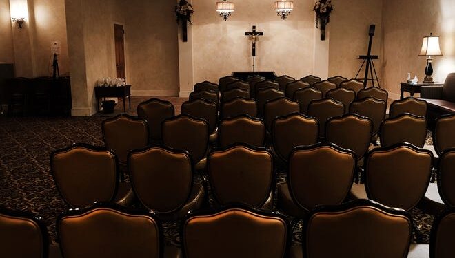 Few eligible families have applied for government help to pay for COVID funerals